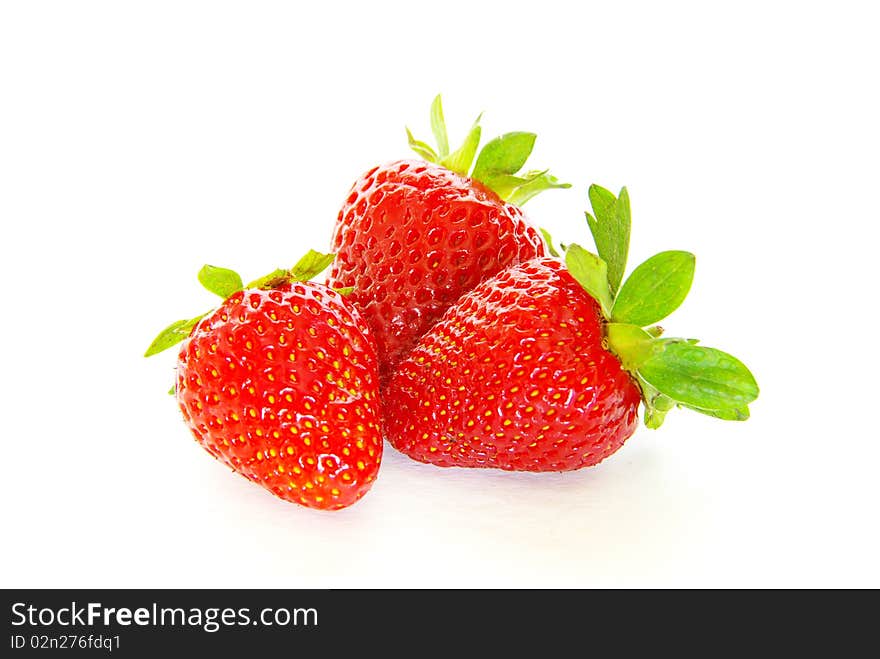 Strawberries isolated over white background