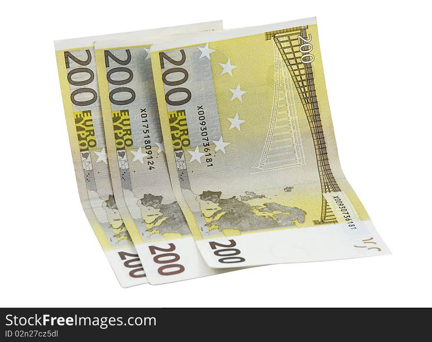 Three 200 euro banknotes isolated over white background. Three 200 euro banknotes isolated over white background