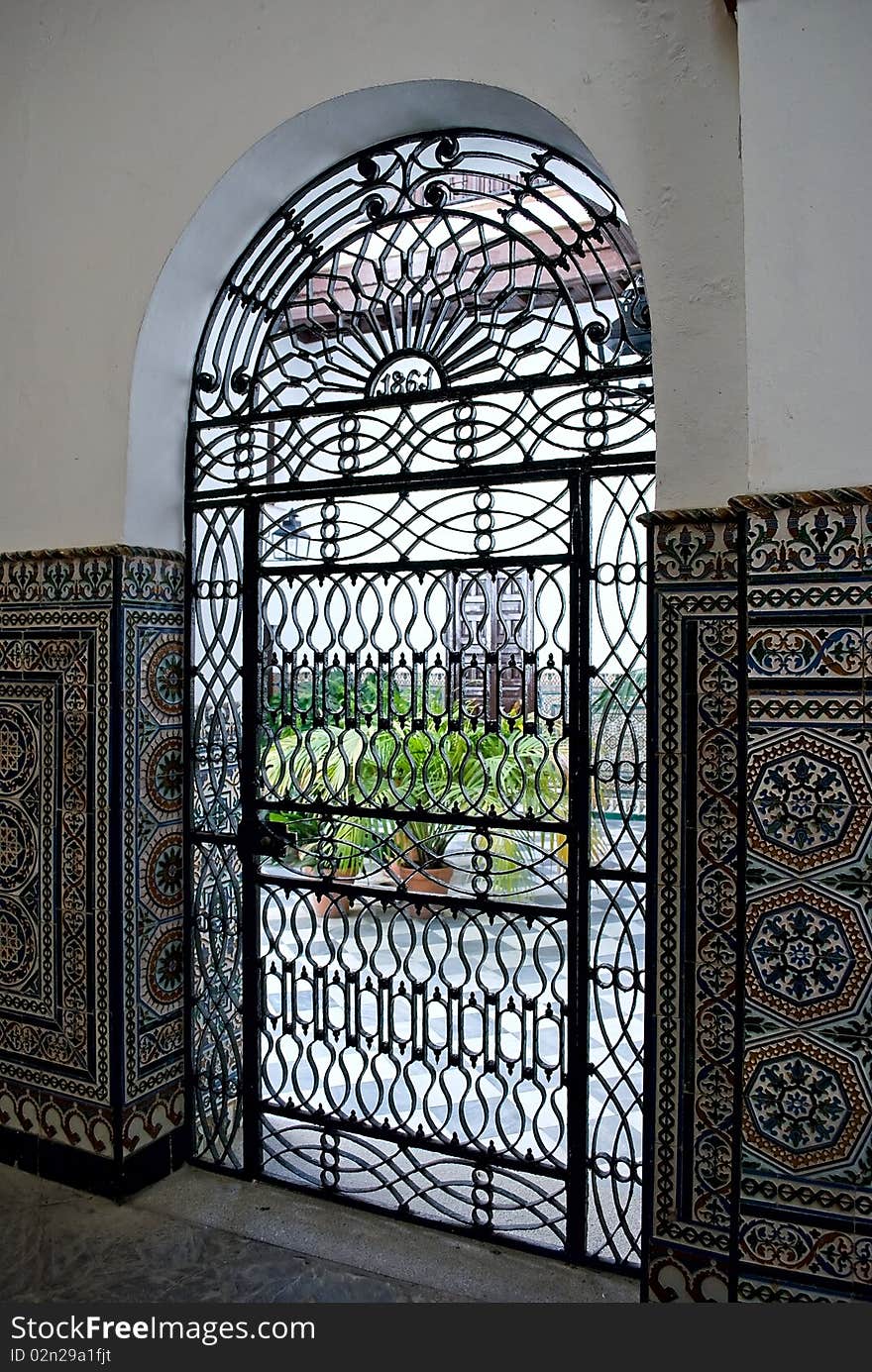 Beautiful wrought bars in the beautiful archways. Beautiful wrought bars in the beautiful archways