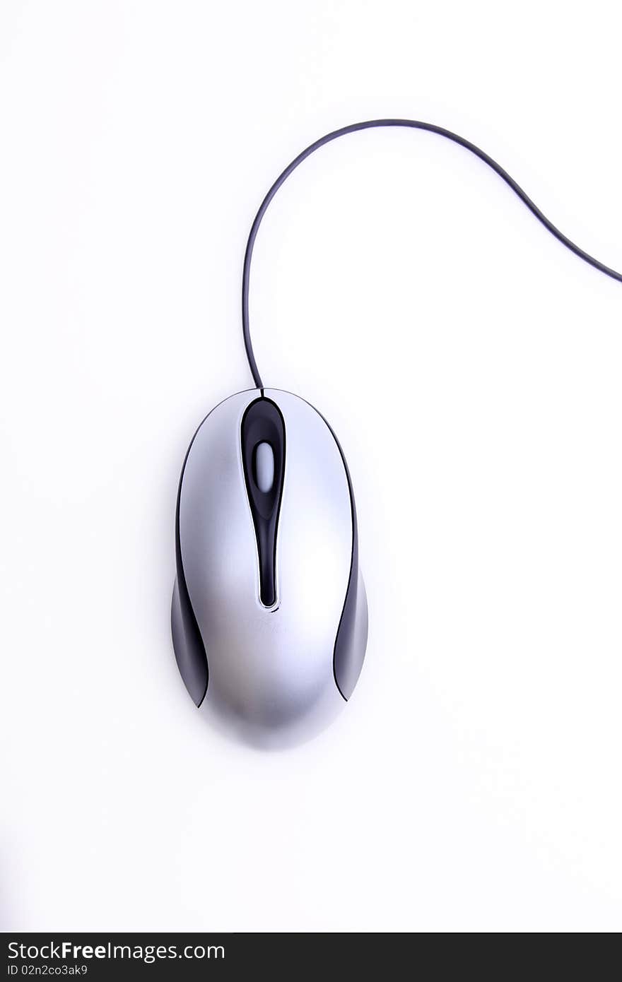 Gray and black computer mouse over white background