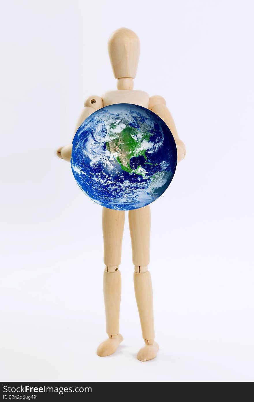 Wooden person with planet on hands. White background. Wooden person with planet on hands. White background