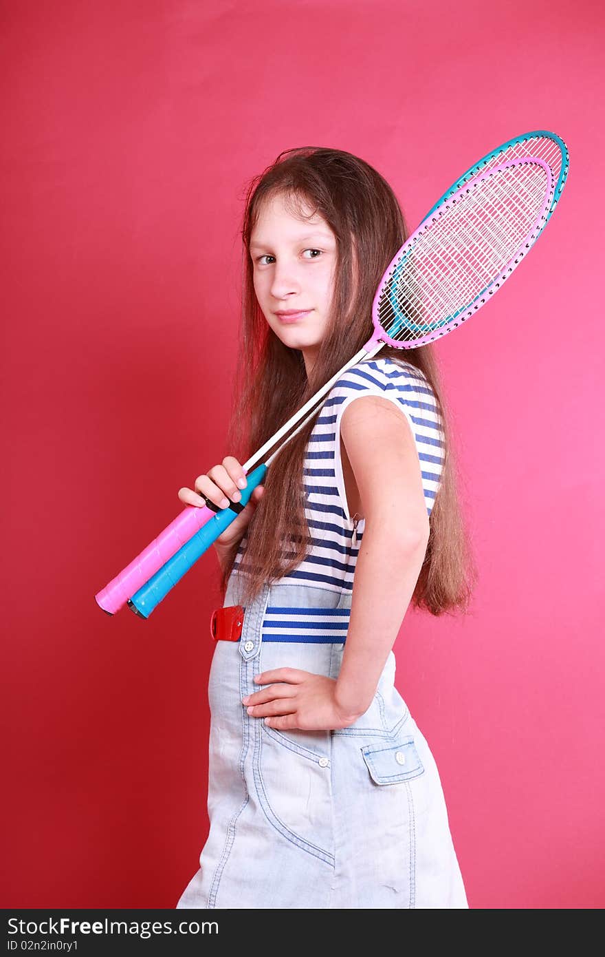 Portrait of sporty teen girl with badminton rackets. Portrait of sporty teen girl with badminton rackets