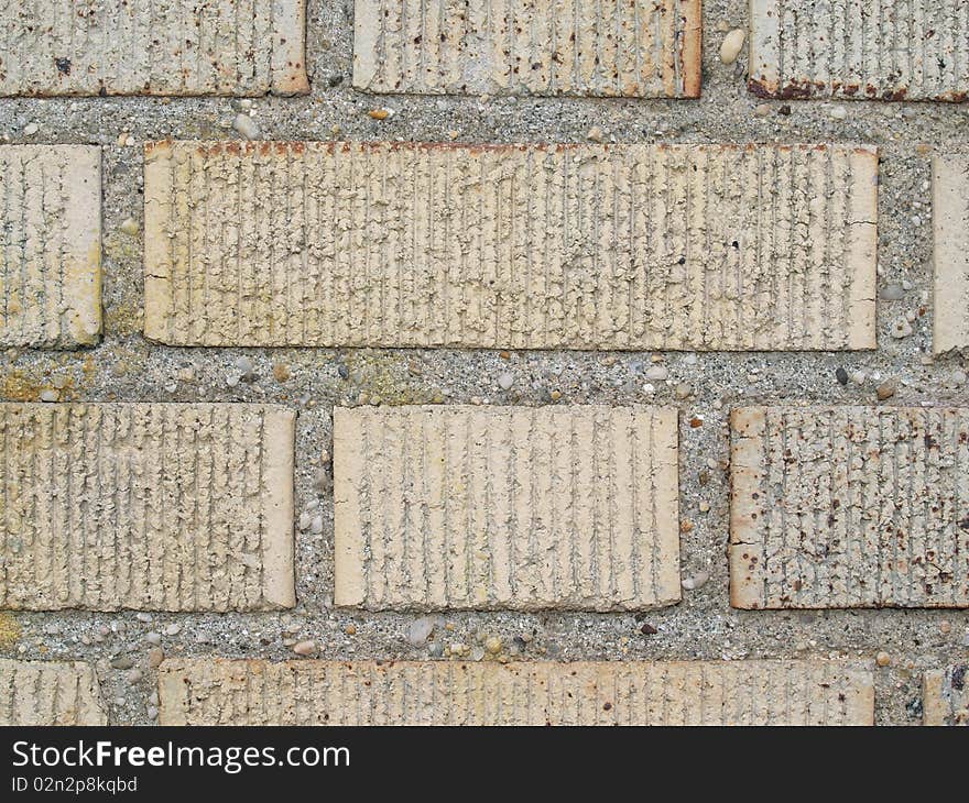 Close up shot of brick and mortar texture with a rough, striped surface. Close up shot of brick and mortar texture with a rough, striped surface.