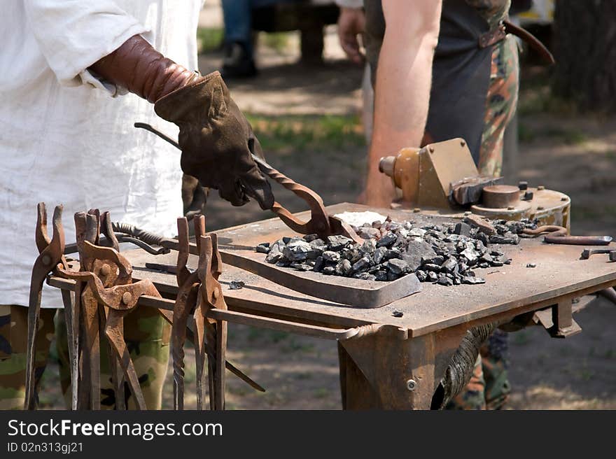 Blacksminth works traditional ancient instruments. Blacksminth works traditional ancient instruments