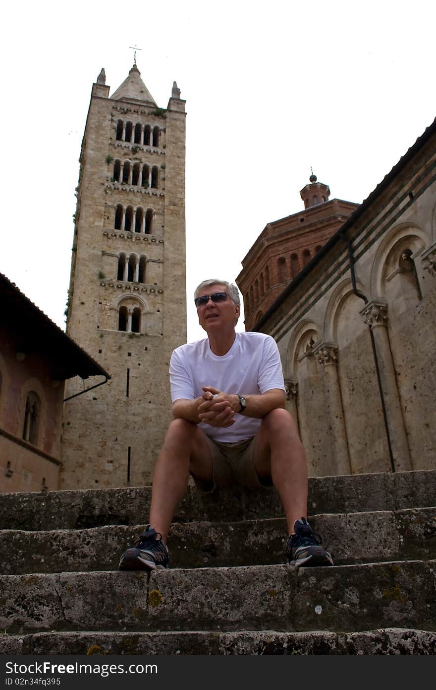 Mature Tourist In Historic Town