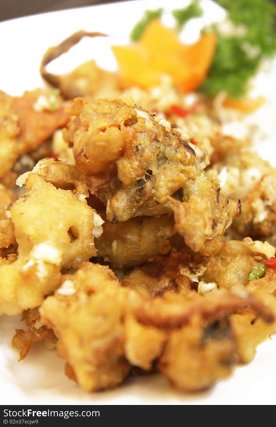 Crispy Soft Shell Crab on White Plate on Chinese Restaurant