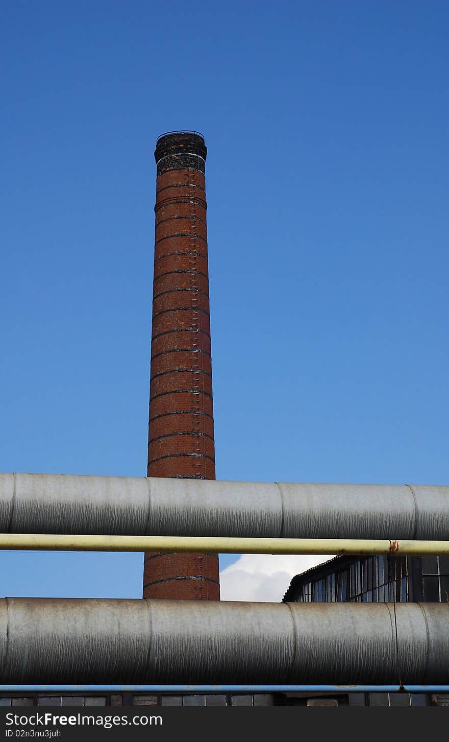 Building of antique factory with chimney. Building of antique factory with chimney