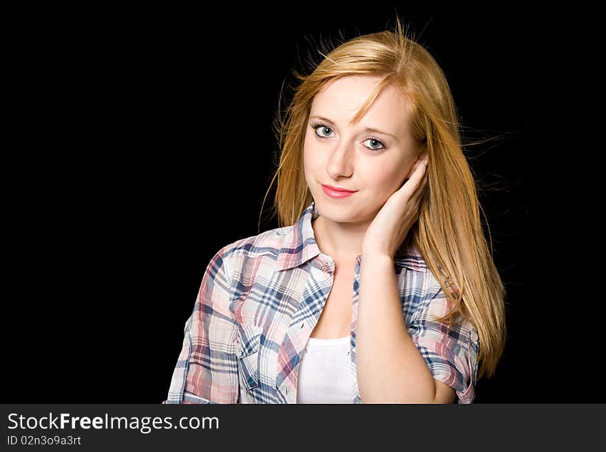 Young very attractive blond female, portrait, studio shoot isolated on black. Young very attractive blond female, portrait, studio shoot isolated on black