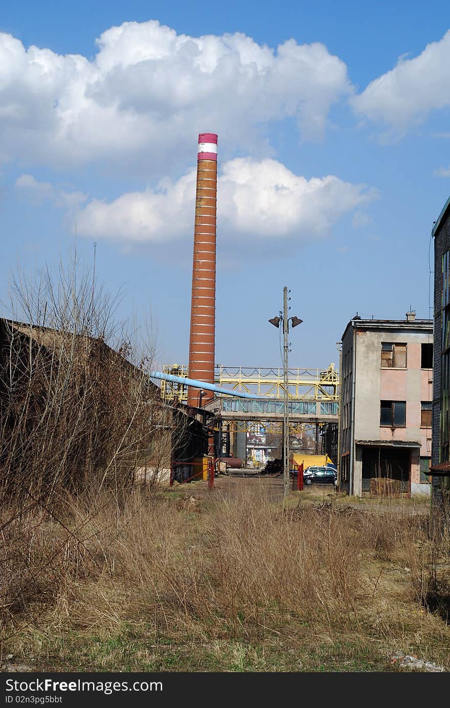 Building of antique factory with chimney. Building of antique factory with chimney