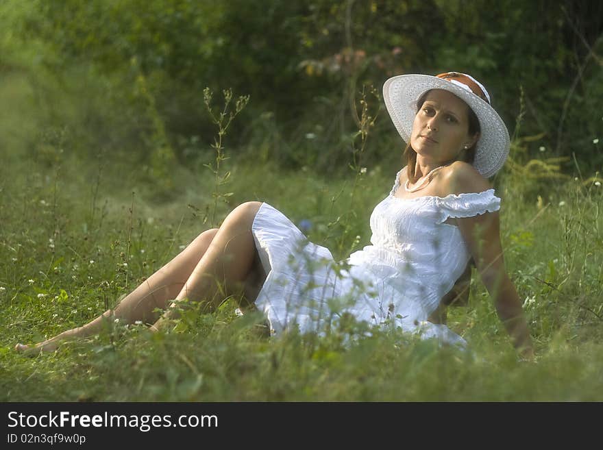 Lady in white dress happy. Lady in white dress happy