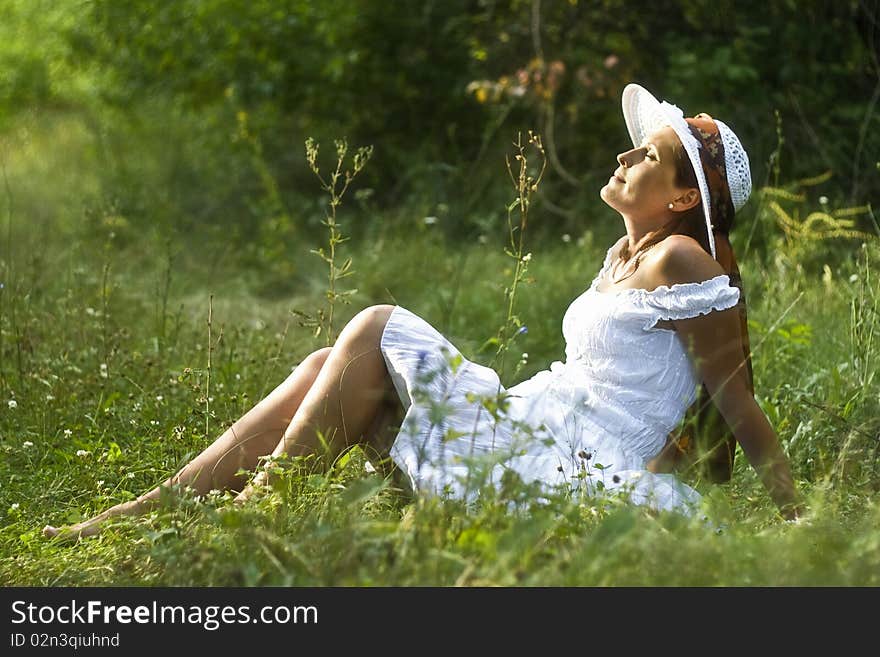 Lady in white dress happy. Lady in white dress happy