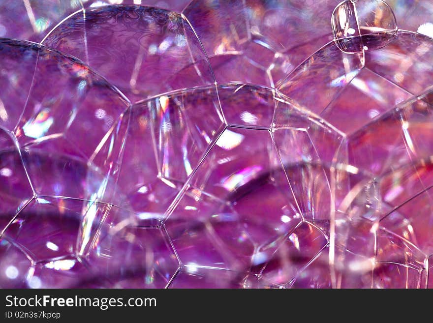 Closeup Soap Bubbles in colored background