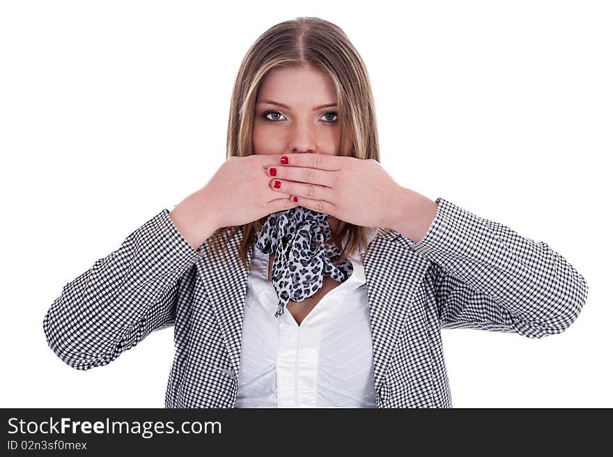 Closeup of young professional women covering her mouth with both hands over isolated white background