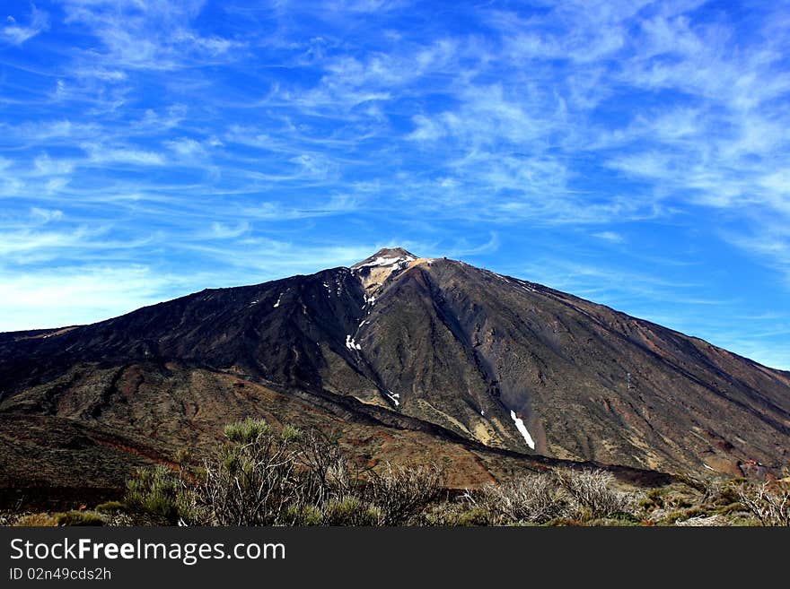 Magnificent feather clouds over Teide volcano