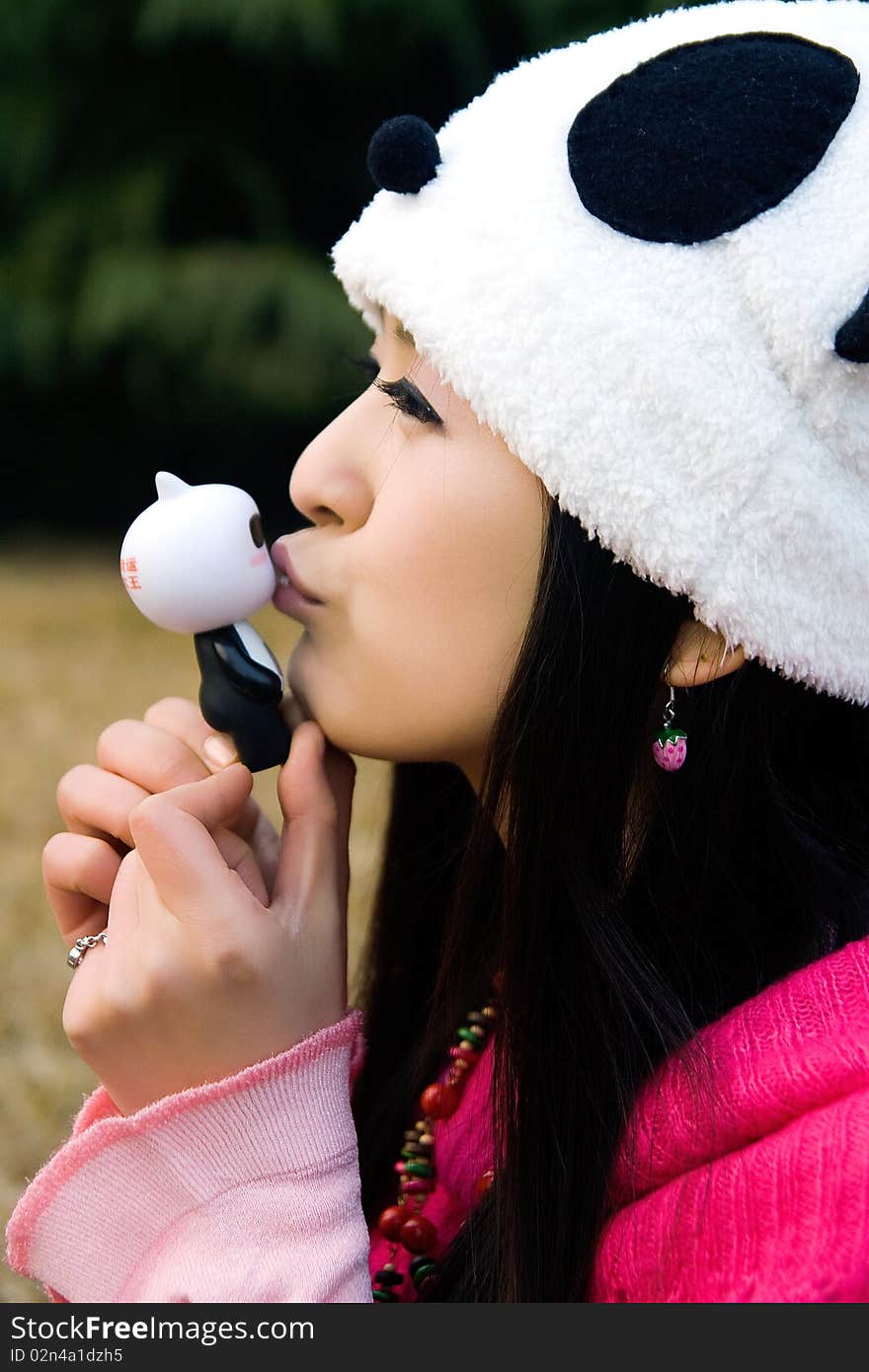 Beautiful Girl Kissing The Puppet