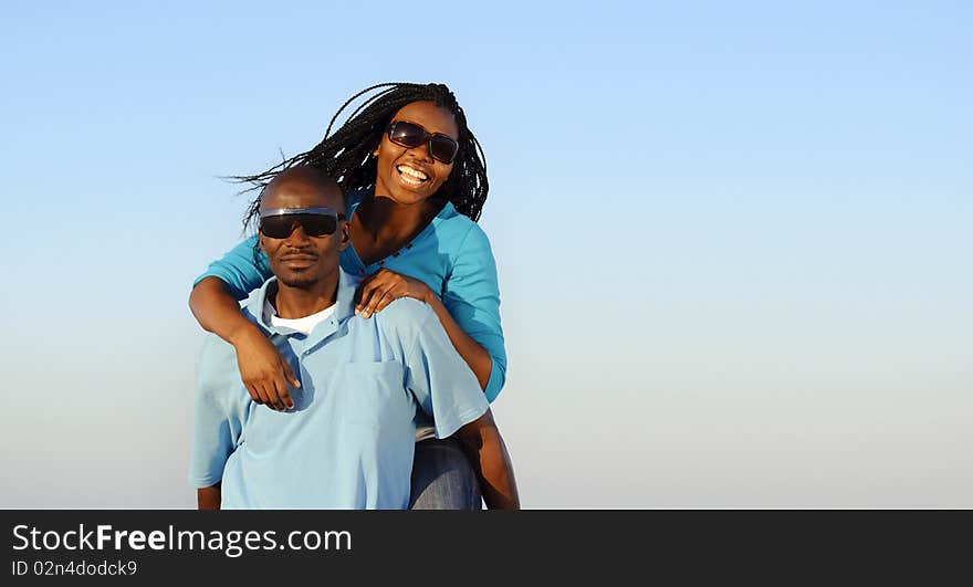 Happy African American couple enjoy the beach. Happy African American couple enjoy the beach