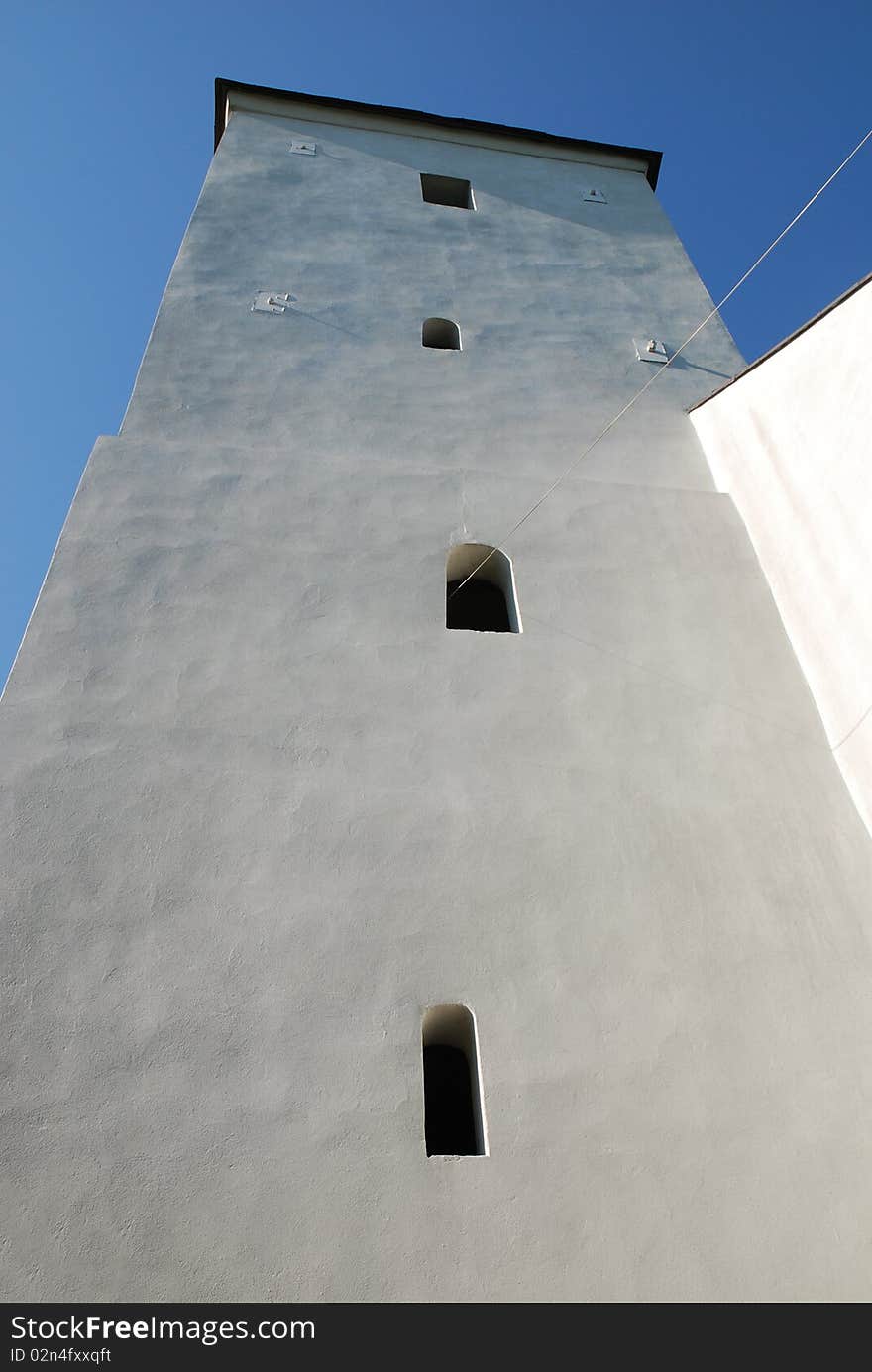 Old church with sun and blue sky