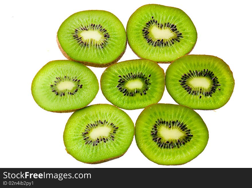 Green sliced kiwi isolated on white