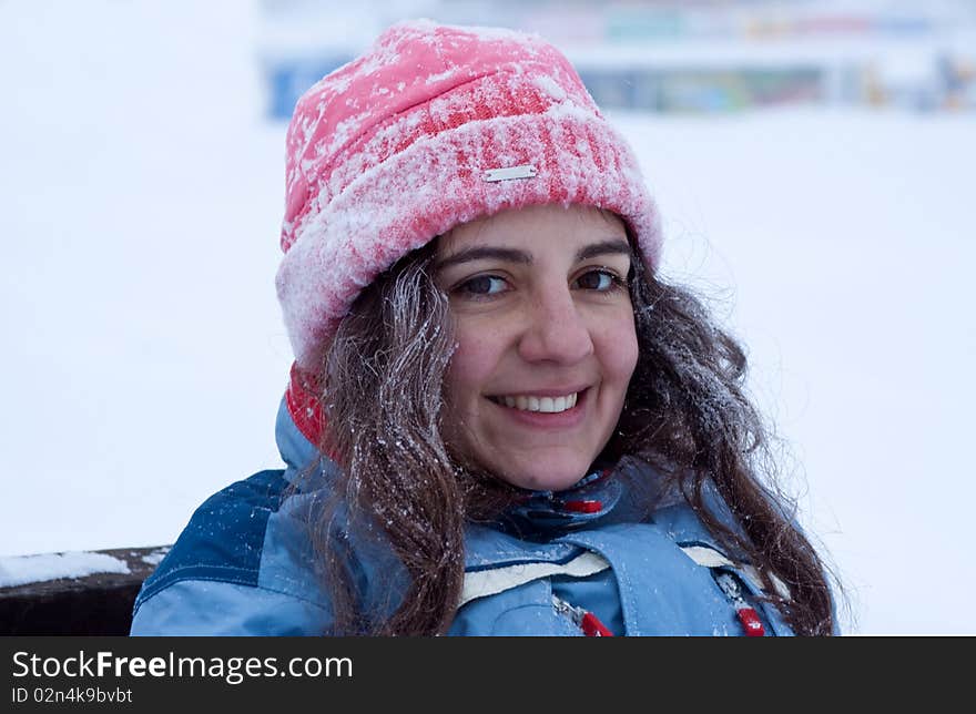 Pretty girl in winter smiling