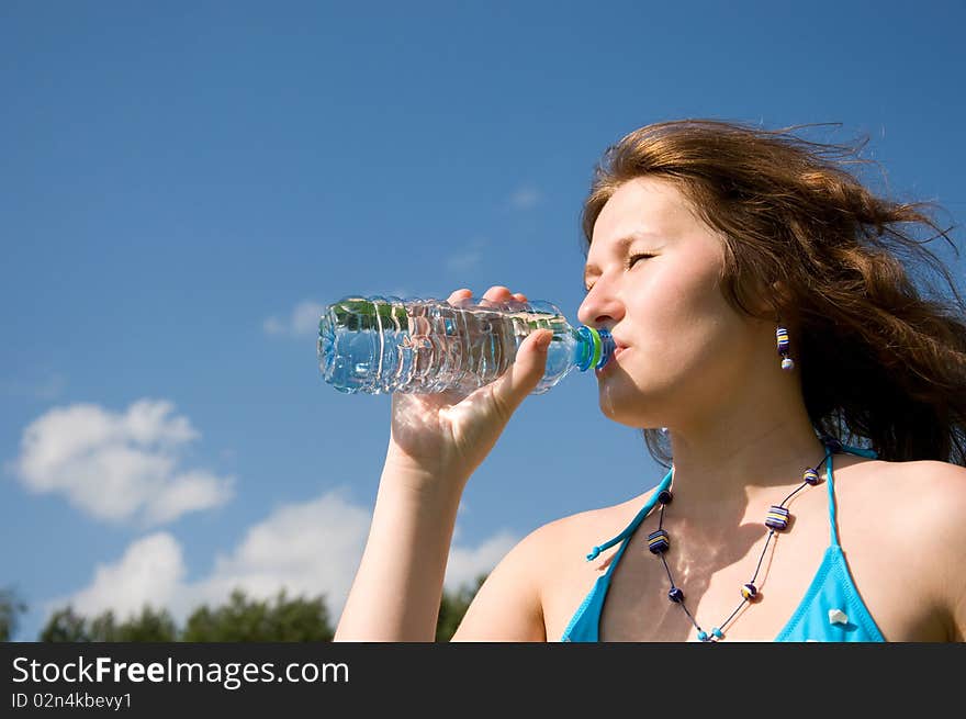 Portrait of attractive drinking woman