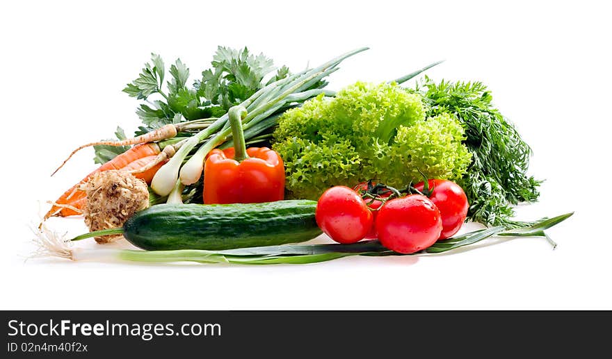 Organic raw vegetables on white background