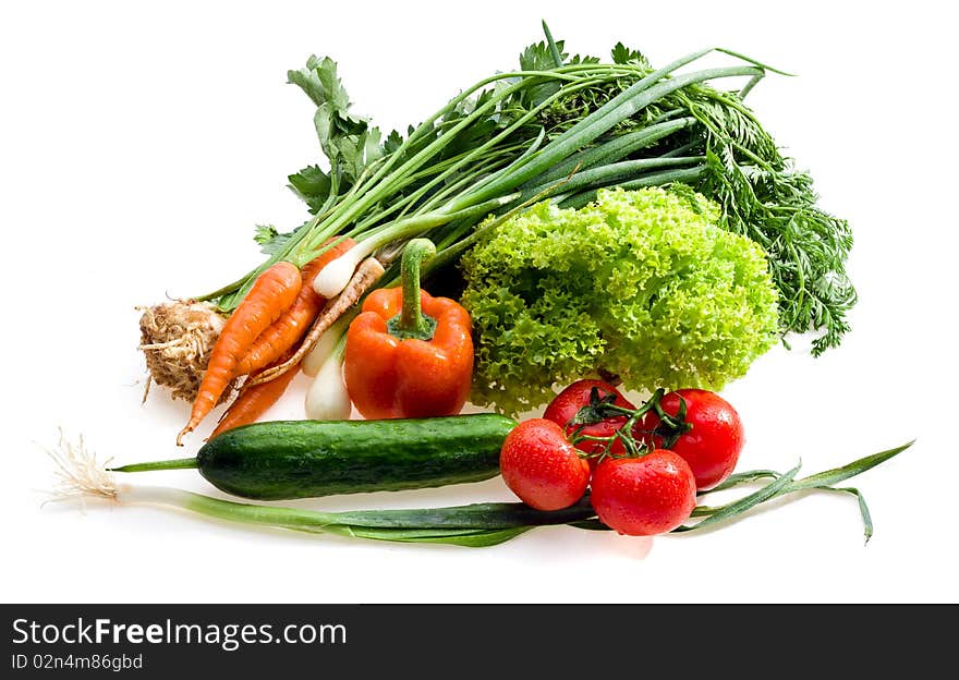 Organic raw vegetables on white background