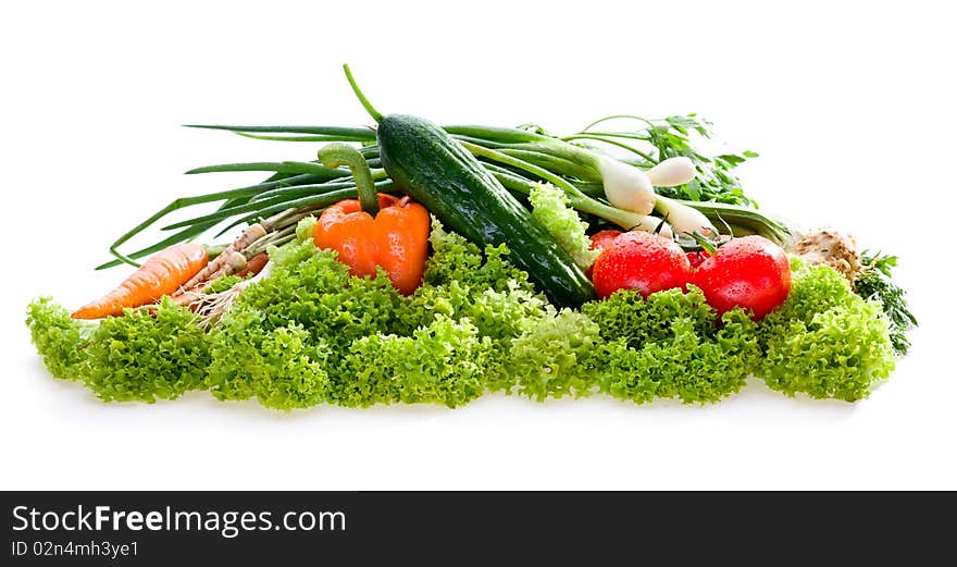 Organic raw vegetables on white background