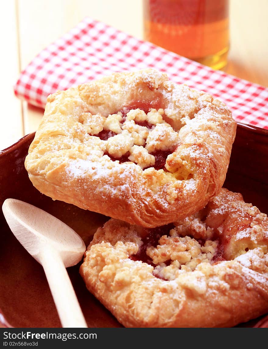 Crisp Danish pastry topped with crumb - detail