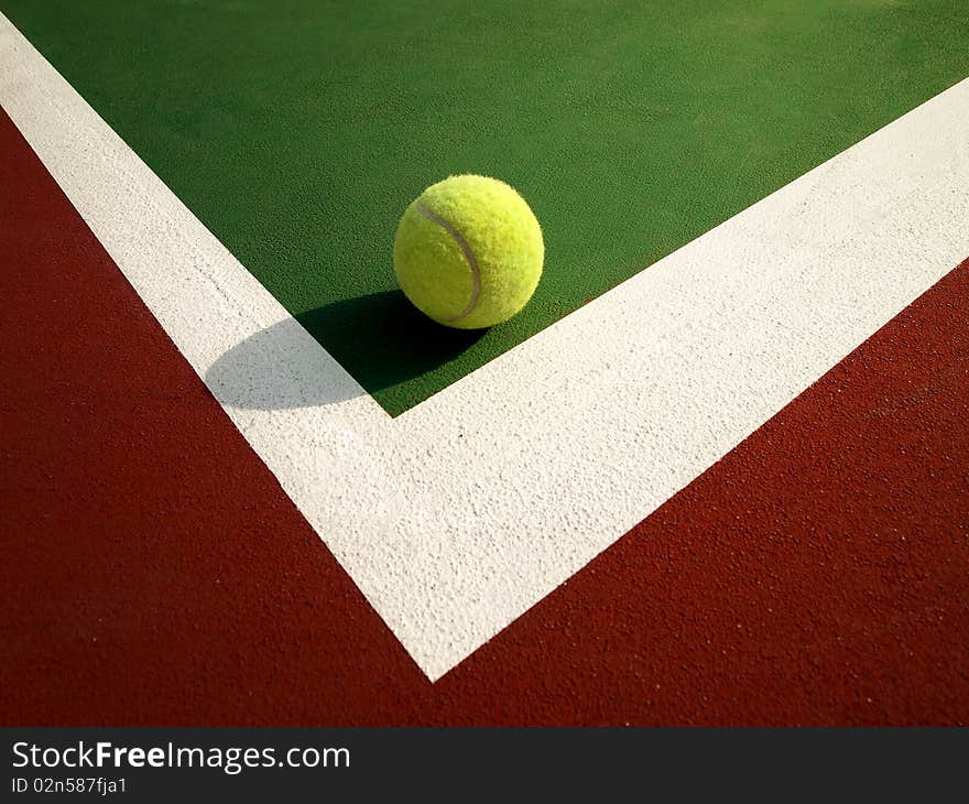 Tennis ball on the Corner of tennis court