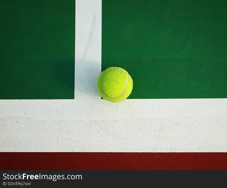 Tennis ball on the Corner of tennis court