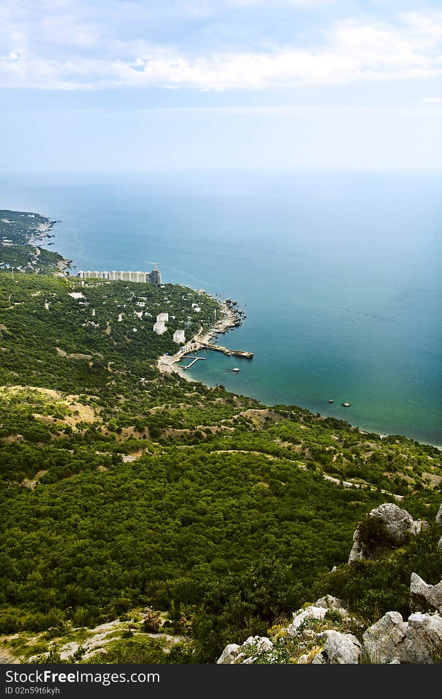 Crimean coastline, black sea surface under the summer sky