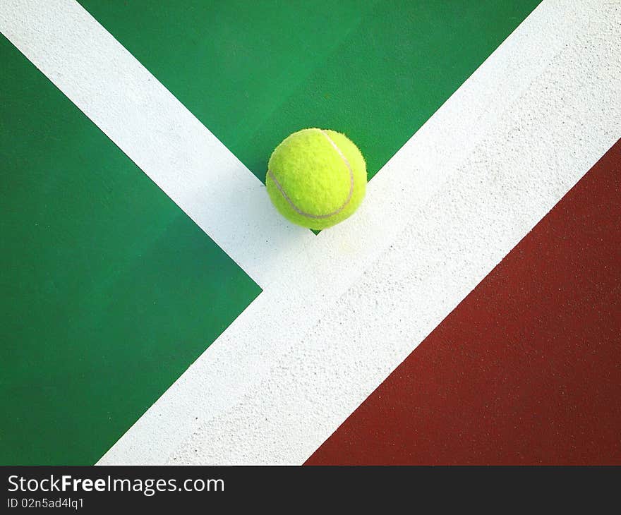 Tennis ball on the Corner of tennis court