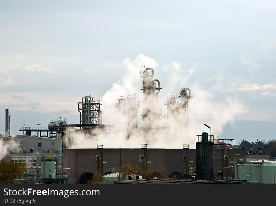 Chemical plant with dust and smoke