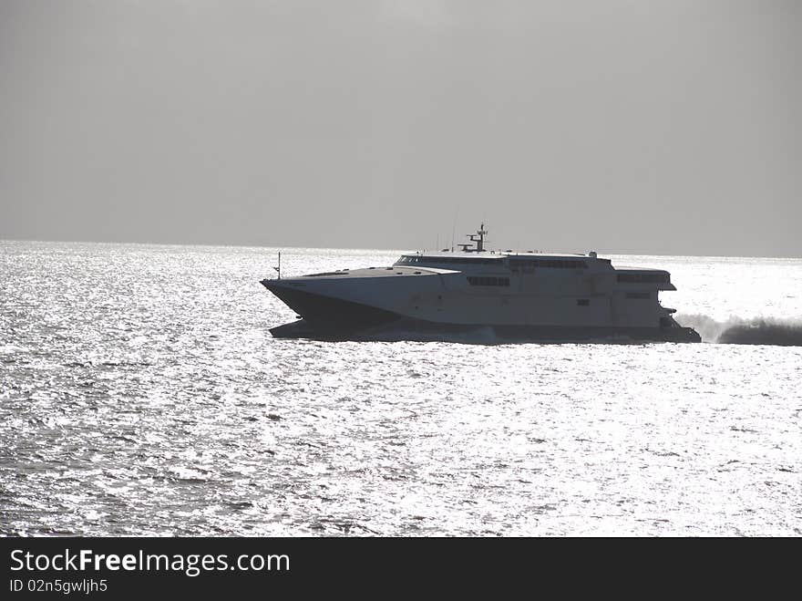 Catamaran type fast ferry navigating Rio de la Plata between Montevideo and Buenos Aires. Catamaran type fast ferry navigating Rio de la Plata between Montevideo and Buenos Aires