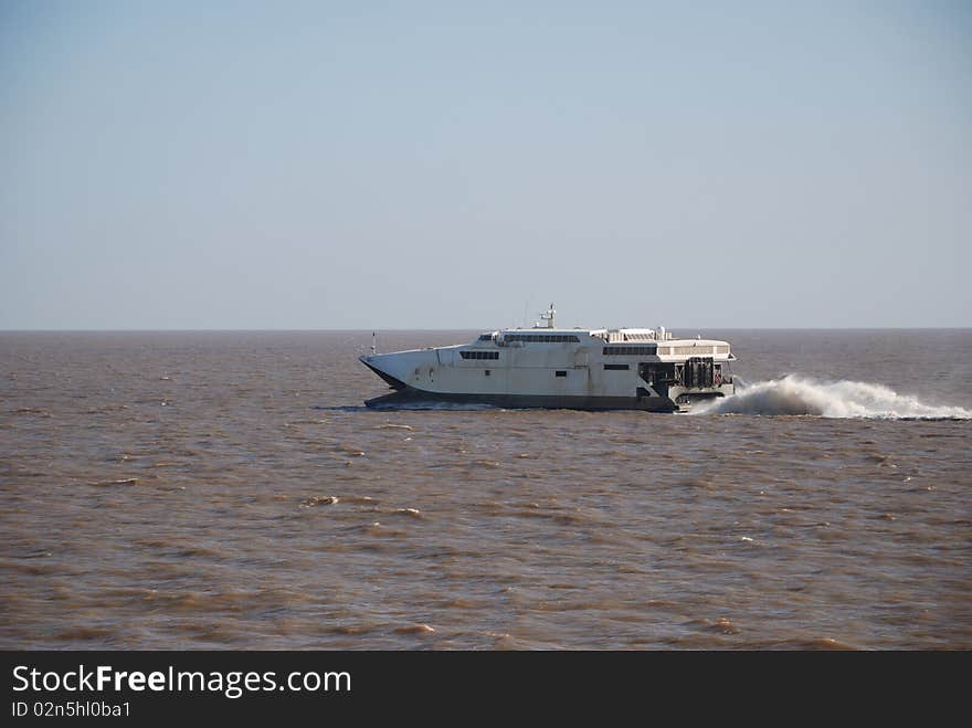 Catamaran type fast ferry navigating Rio de la Plata between Montevideo and Buenos Aires. Catamaran type fast ferry navigating Rio de la Plata between Montevideo and Buenos Aires