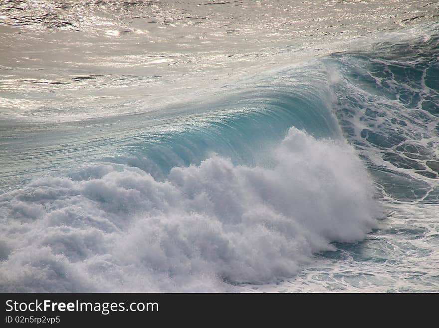 Huge dark green breaking wave and surf. Huge dark green breaking wave and surf