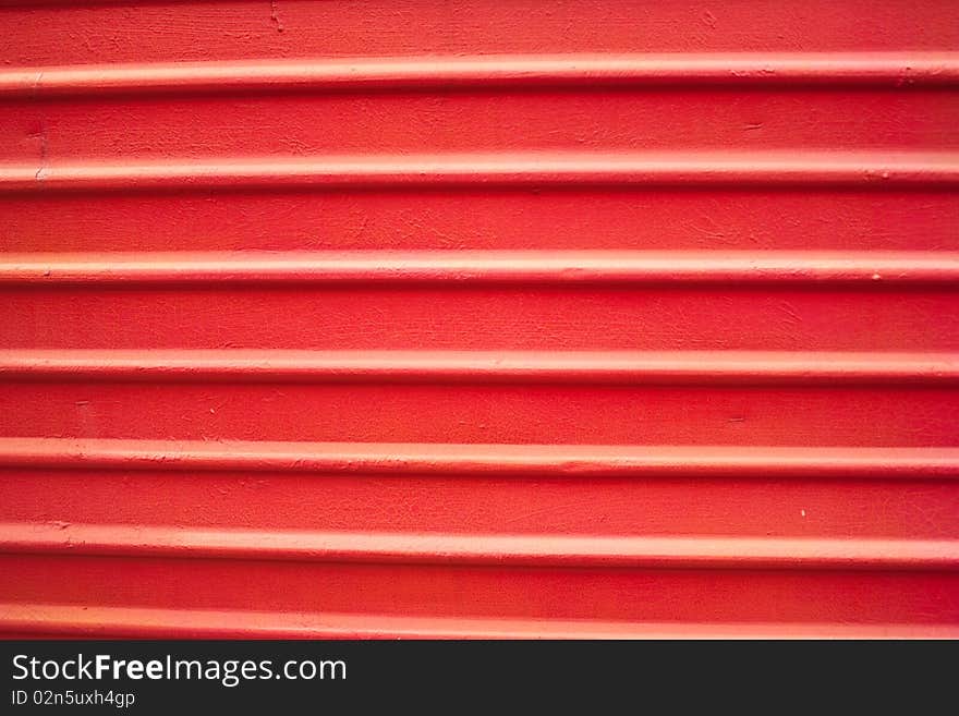 Red wall on the side of the train