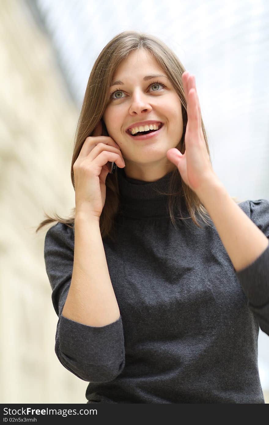 Closeup woman with mobile telephone