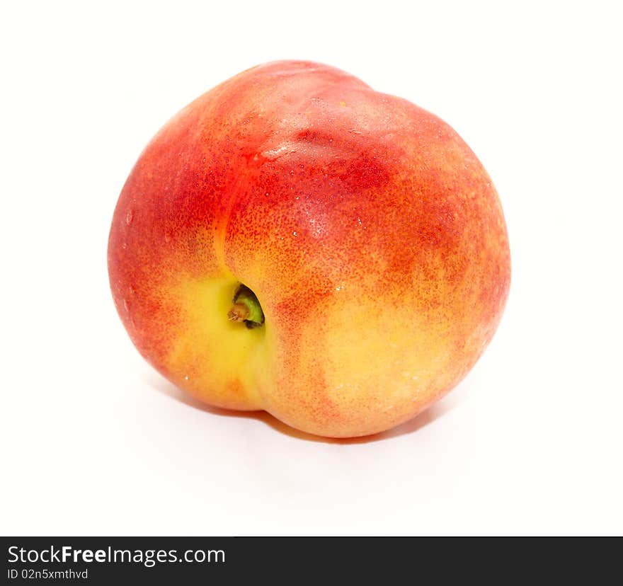 Full peach isolated on white background