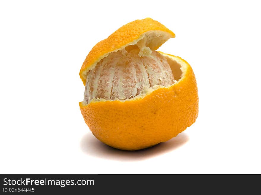 Round orange with which partially clear away rind. Round orange with which partially clear away rind