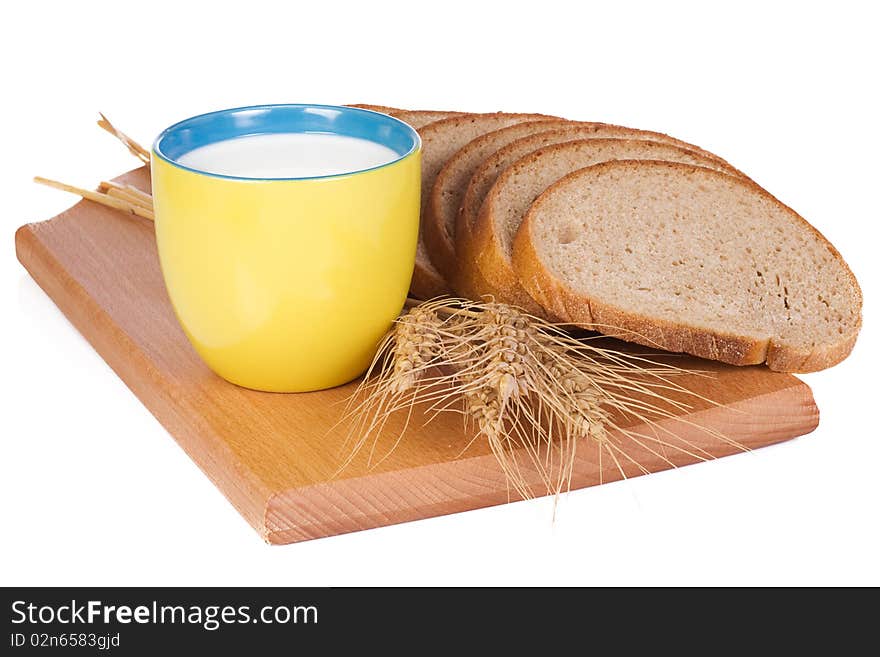 Cup, bread and wooden board. Cup, bread and wooden board