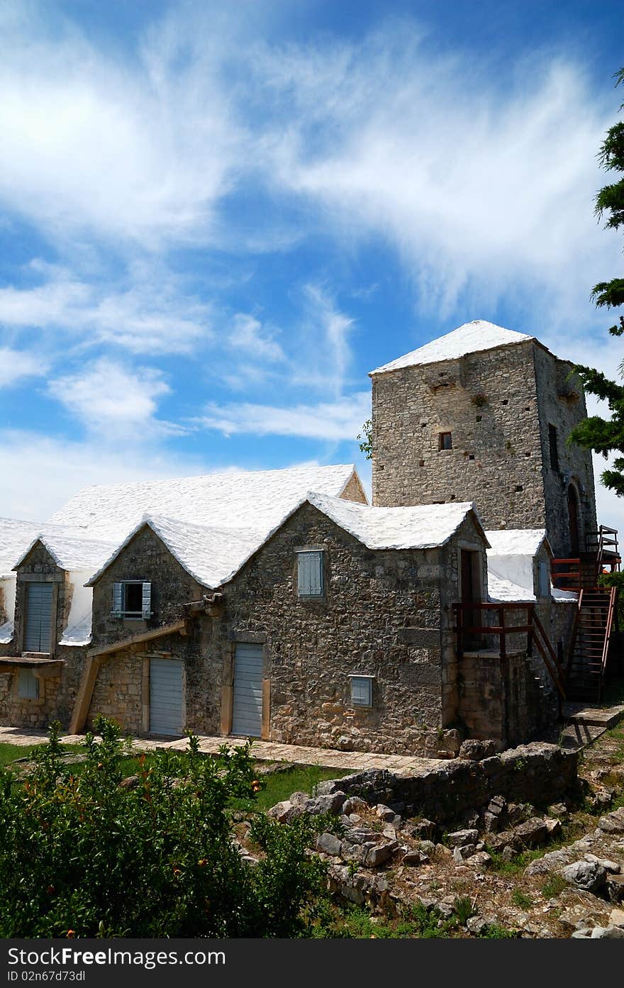 Mediterranean rural house with white roof in Skrip, Croatia.