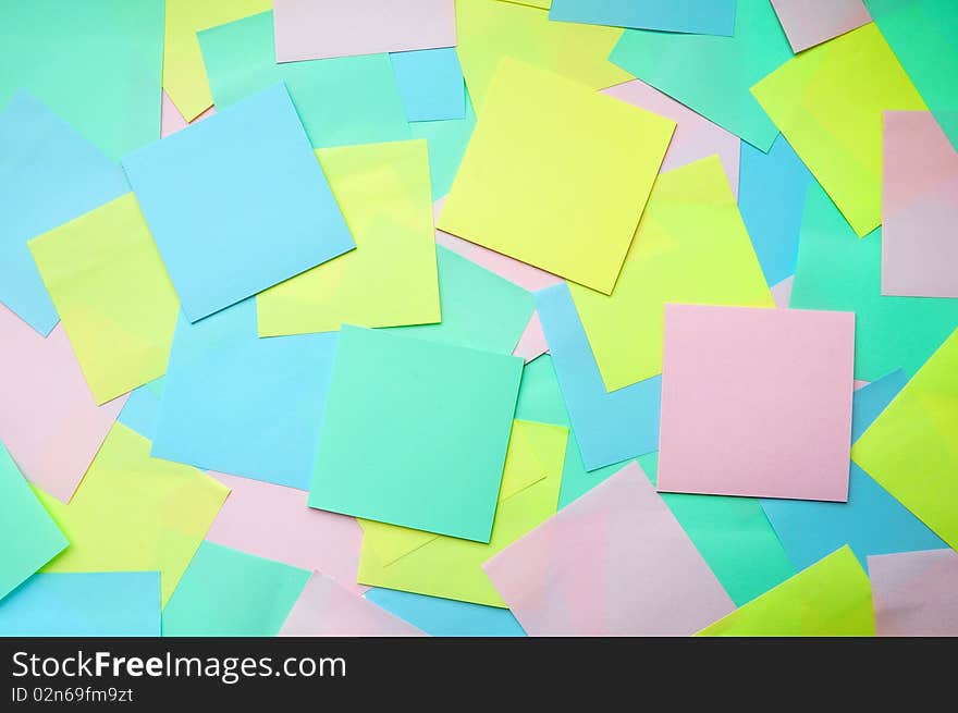 Background of bright paper pieces for notes. Background of bright paper pieces for notes