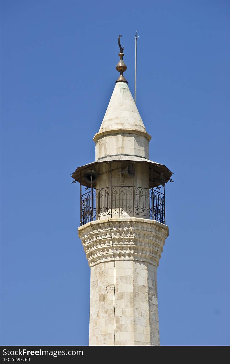 White MInareet of a mosque in down tow beirut. White MInareet of a mosque in down tow beirut