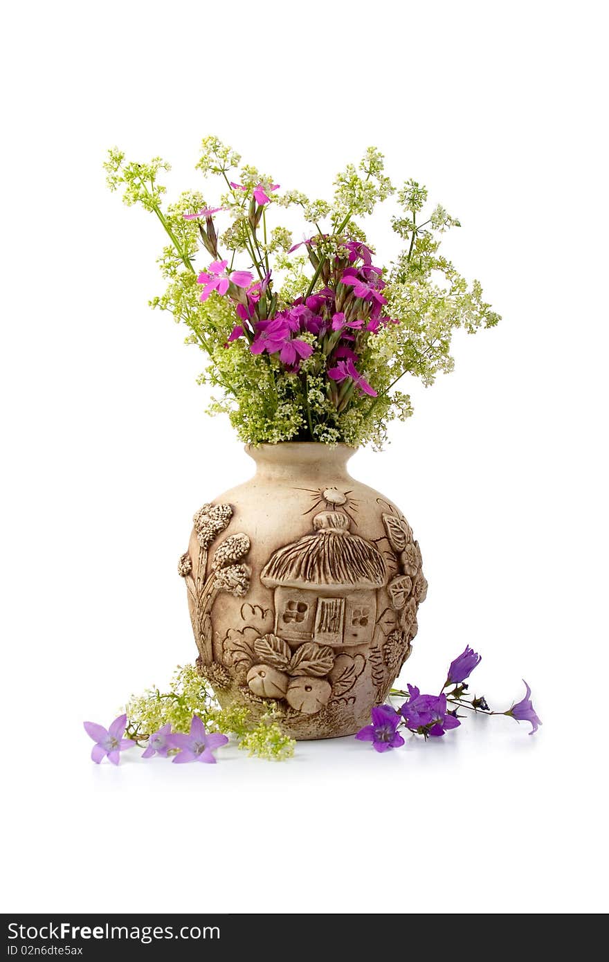 Beautiful bouquet of wild flowers on a white background