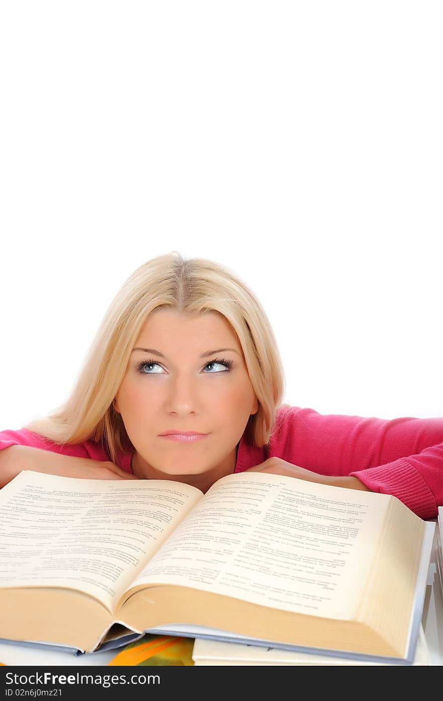 Young pretty tired student girl with lots of books in panic. isolated on white background