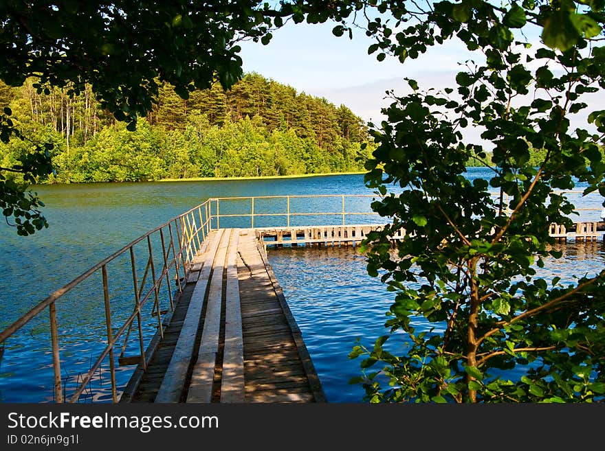 Swimming pier at a lake in Sosnovo, Russia. Swimming pier at a lake in Sosnovo, Russia.