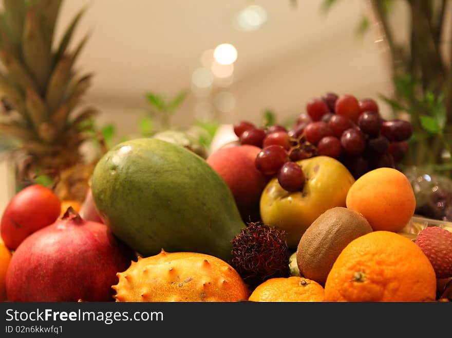 Exotic fruits basket displayed in warm light