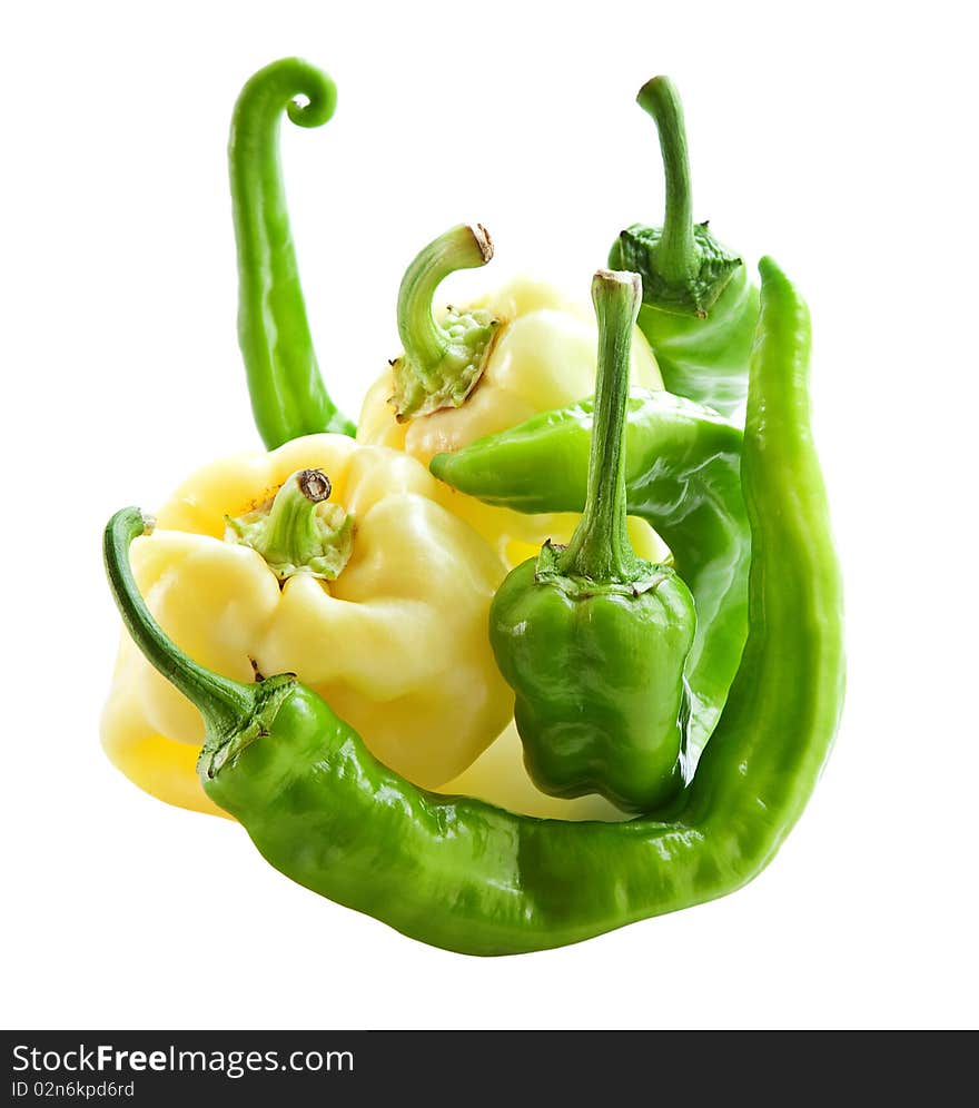 Composition of the spicy green pepper isolated on a white . Composition of the spicy green pepper isolated on a white .