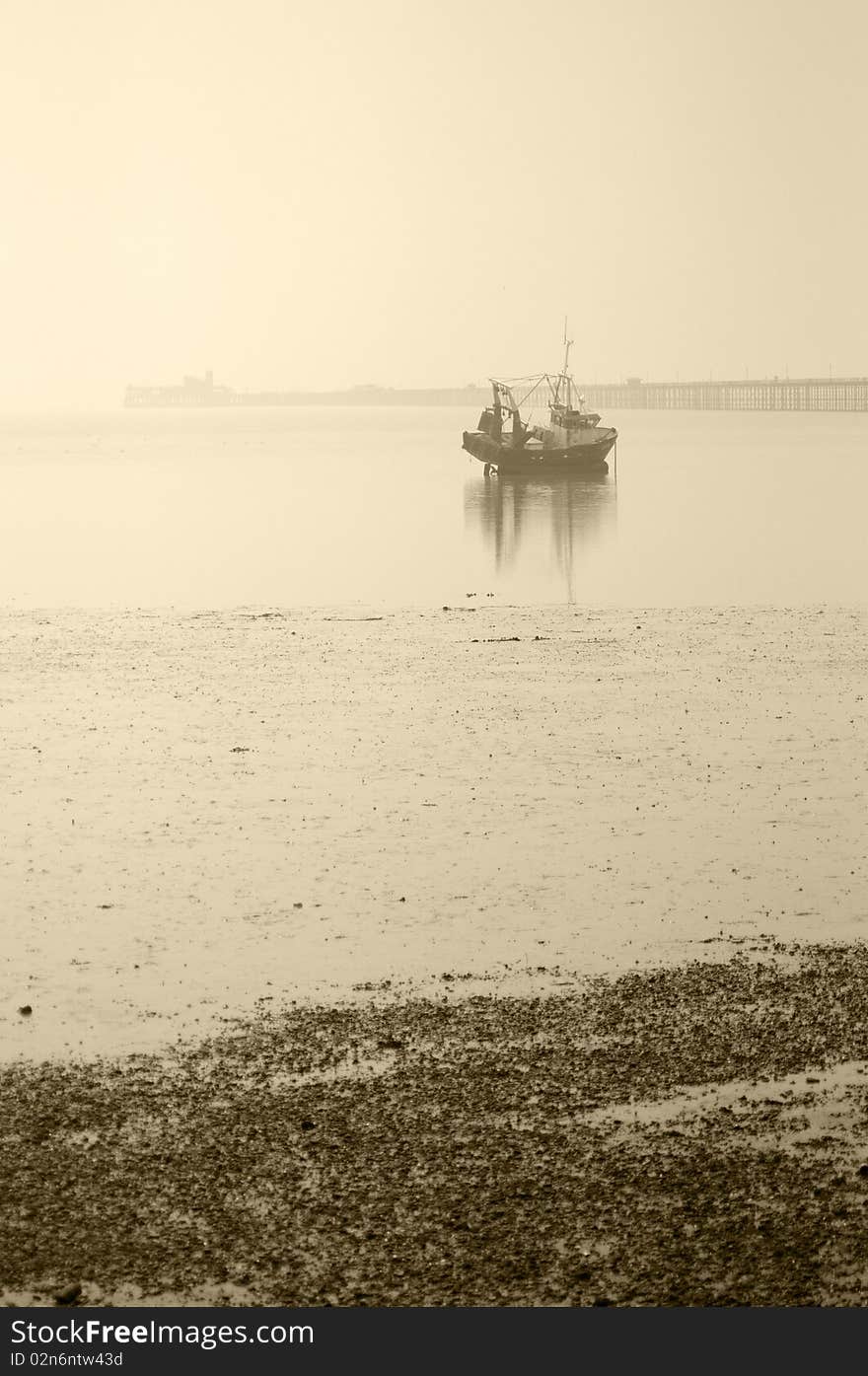 Misty weather and one boat waiting